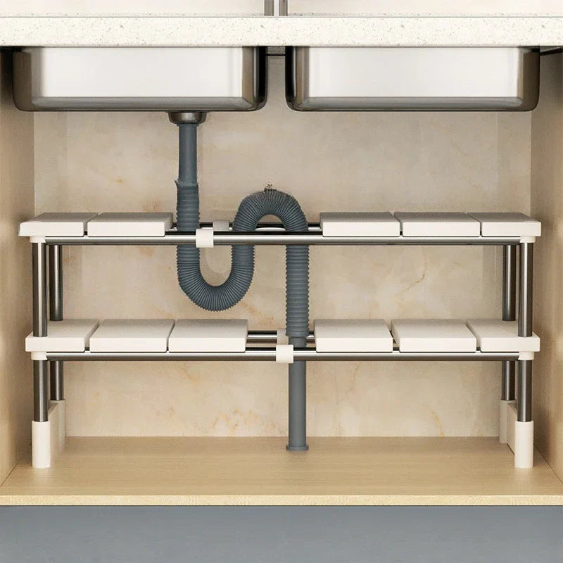 Pipe dodging under sink shelving